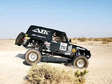 0812_4wd_02_z%2B1998_jeep_wrangler_desert_race_car%2Bright_side_jump.jpg